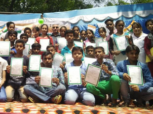 Group photo with beneficiaries at Vidya